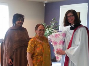 Marion Karasiuk presented with flowers after preaching